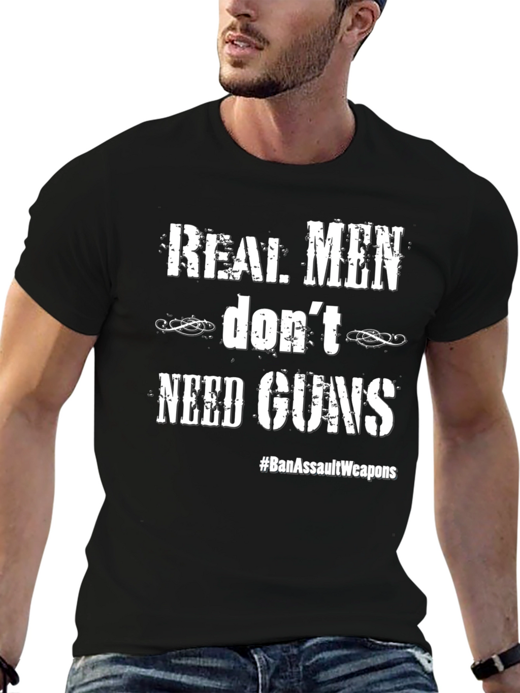 Real Men Dont Need Guns Graphic Tee