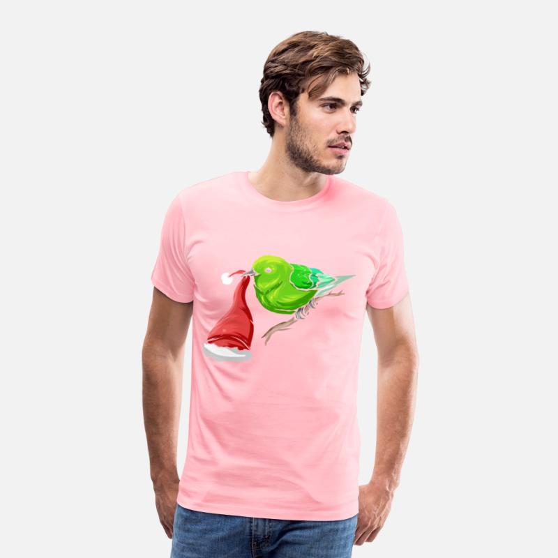 Little Green Bird Carrying Santas Hat In Beak On